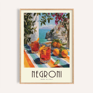 Framed close-up of Italian Drink Posters showing negroni cocktails with orange peel and coastal view