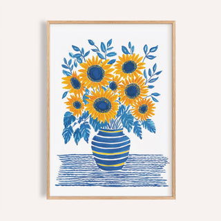 Framed Sunflower Print with yellow flowers and blue leaves in a striped blue and yellow vase