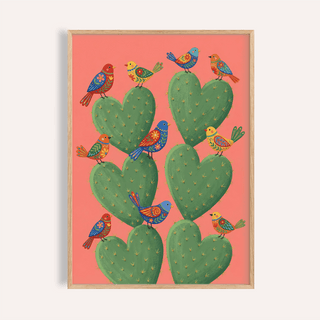 Framed Cactus Heart Poster showing a heart-shaped green cactus with colourful birds on a coral background