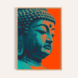 Framed Buddha wall art of a blue statue head against an orange background