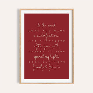Red most wonderful time quote print shown on a plain warm wall