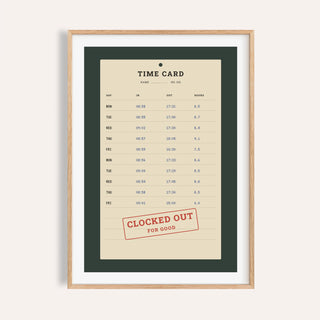 Clocked out time card print shown on a plain warm cream wall