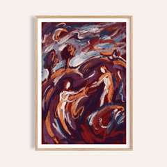 Framed Abstract Couple Art Print with swirling brush strokes in rich reds and oranges on a white wall