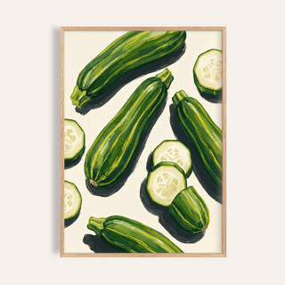 Framed zucchini wall art featuring green illustrated zucchinis on a cream background