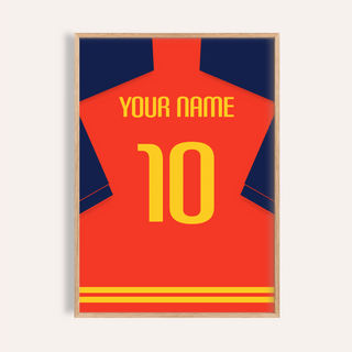 Framed football shirt poster in red with navy sleeves and yellow number close-up