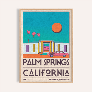Framed Palm Springs art print of a retro desert house with pink car and orange sun