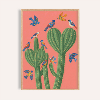 Framed Cactus Poster Print showing colourful birds on green cactuses with a coral background