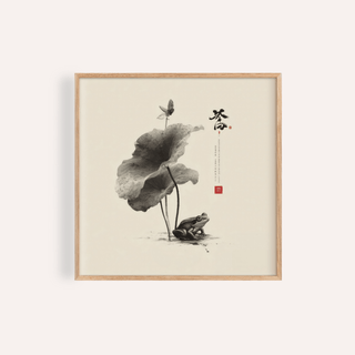 Framed Japanese Frog Art of a black and grey frog under a lotus leaf with calligraphy