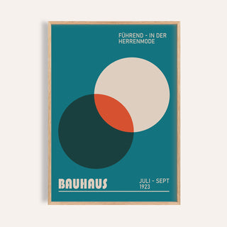Framed print of modern office wall art showing overlapping circles in teal, beige, black, and orange