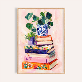 Books and plants art print of stacked books with green potted plants in colourful pots