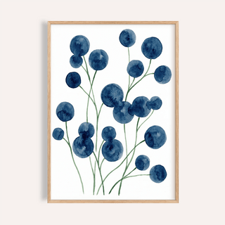 Framed close-up of watercolor flower wall art with blue blooms and green stems