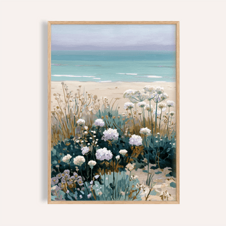 Framed print of Beach Floral Art with white beach flowers and muted greens against a sandy shore background