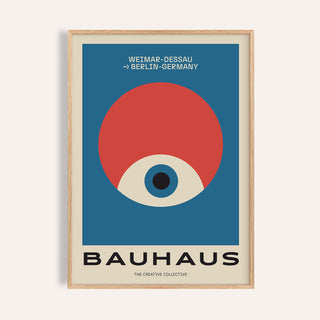 Framed print with modern geometric abstract art showing an eye shape in red and blue with black text