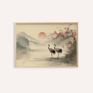 Framed Japanese art poster of two cranes near water with a red sun and cherry blossoms