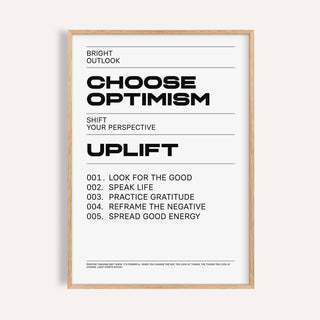 Framed uplifting wall art with black typographic motivational text on a white background