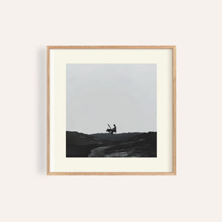 Framed Piano Abstract Art with a silhouette playing piano in black and grey tones