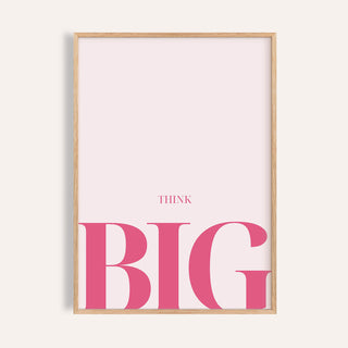 Framed close-up of think big typography with pink letters on pale background