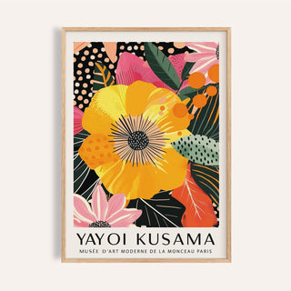 Floral wall prints showing a framed yellow tropical flower illustration with pink and green leaves