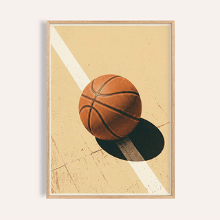 Sports wall art of a basketball casting a shadow on a cream court with a white stripe