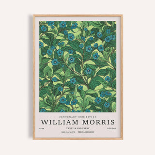 Framed print of a blue flower branch with green leaves in a botanical illustration style