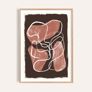 Framed abstract earth tone print of flowing shapes and white lines on a dark background