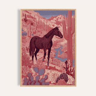 Western horse wall art featuring a black horse standing in a red desert landscape with cacti