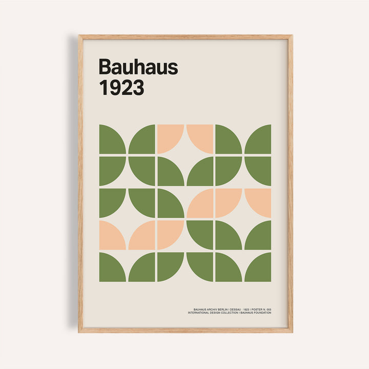 Framed Mid Century Modern wall art with green and peach geometric shapes