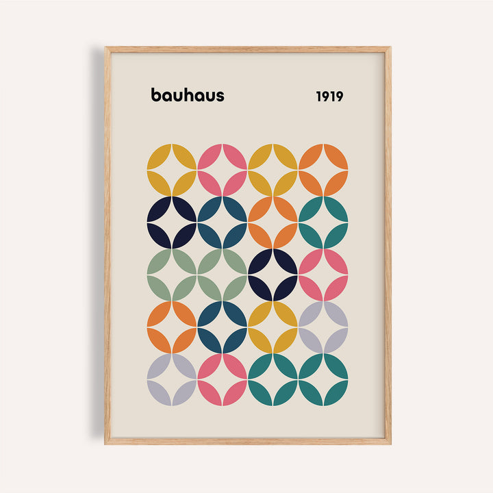 Framed close-up of a colorful grid pattern with Bauhaus style circles in muted tones