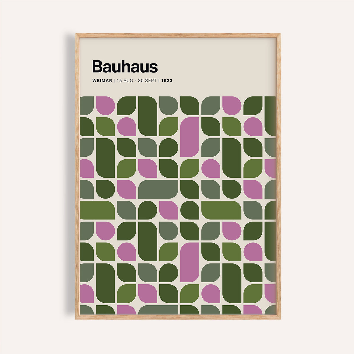 Framed Bauhaus Exhibition 1923 print with green and purple geometric leaf pattern on cream background