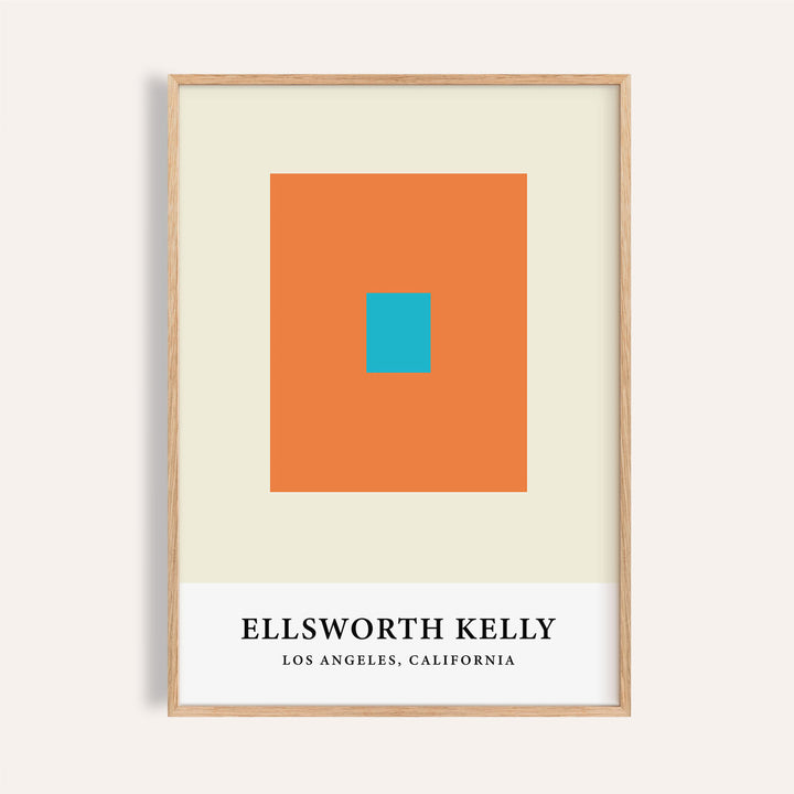 Framed print of Ellsworth Kelly Artwork with central blue square on orange background and text label below