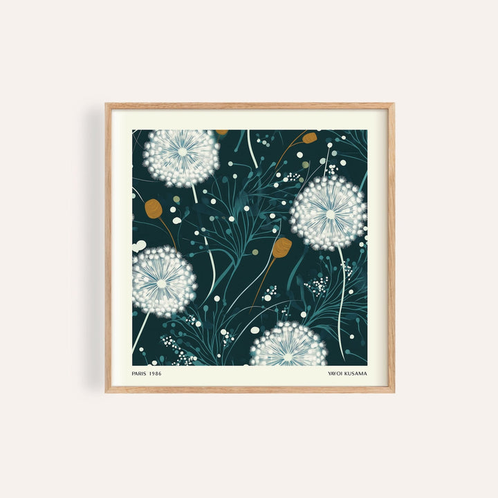 Framed dandelion wall art with white and brown botanical illustration on dark green background