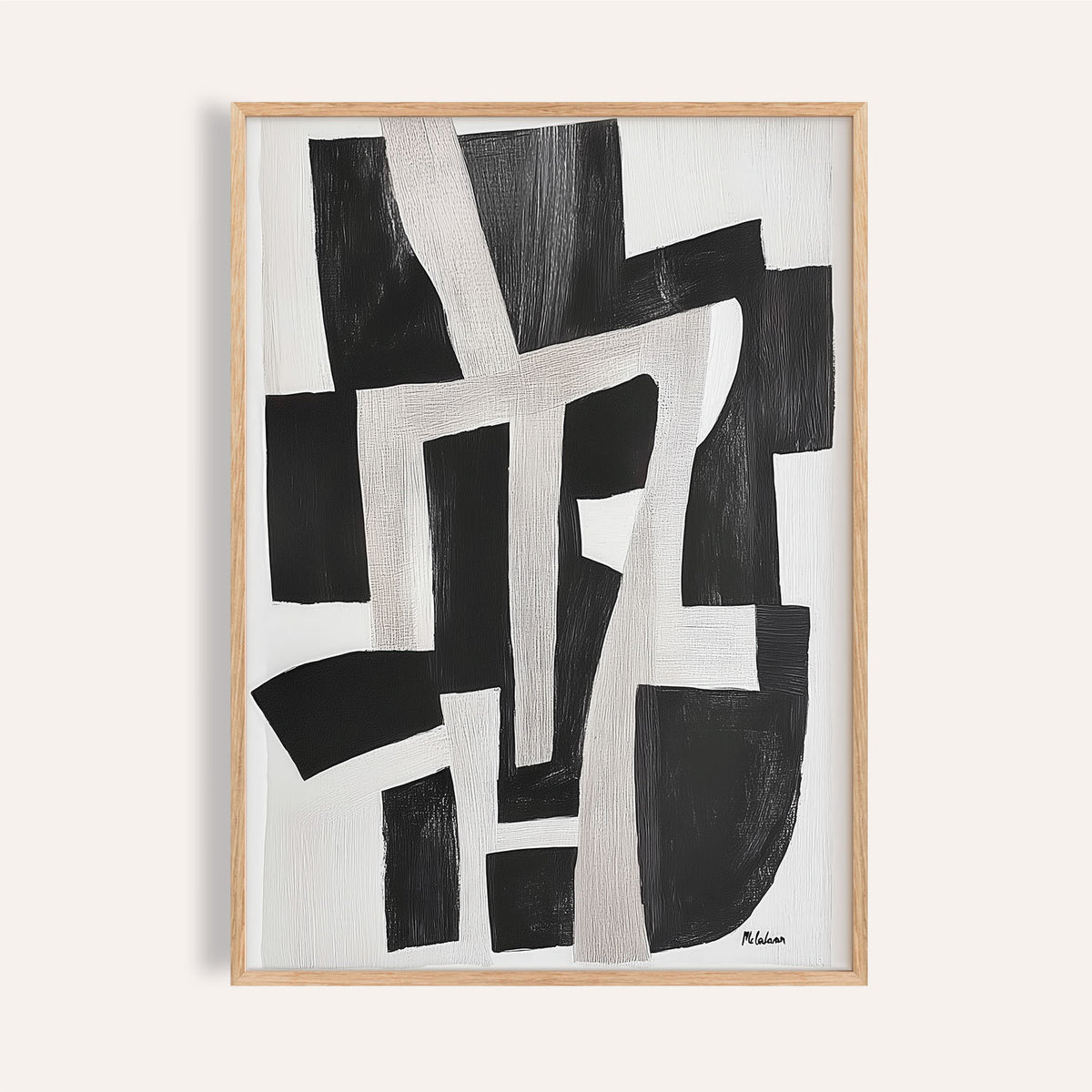 Framed print of abstract black and white shapes in a minimalist style