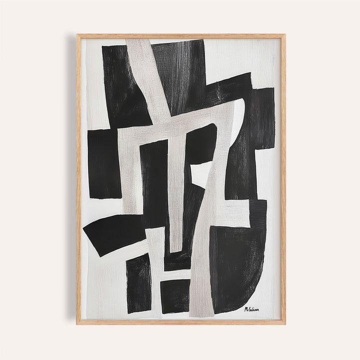 Framed print of abstract black and white shapes in a minimalist style