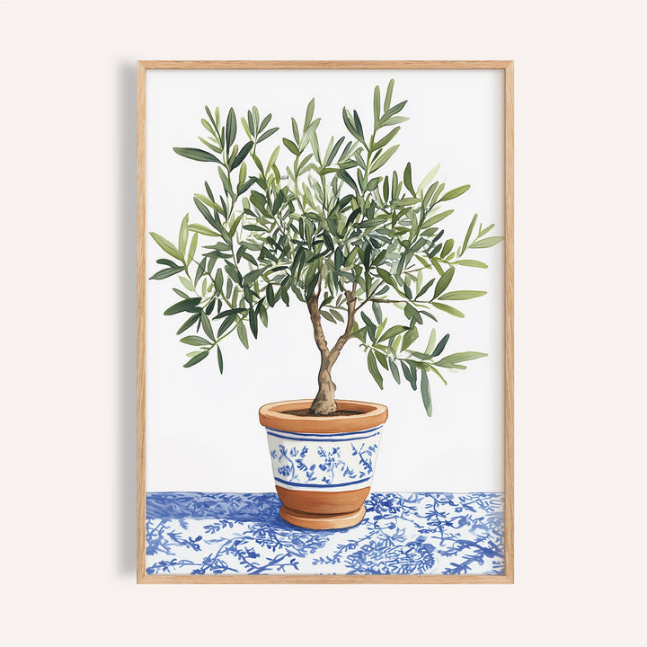 Framed Olive Tree Art Print of a green olive tree in a terracotta pot with blue floral patterns
