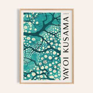 Framed teal wall art for living room showing abstract tree branches with white dots and artist name