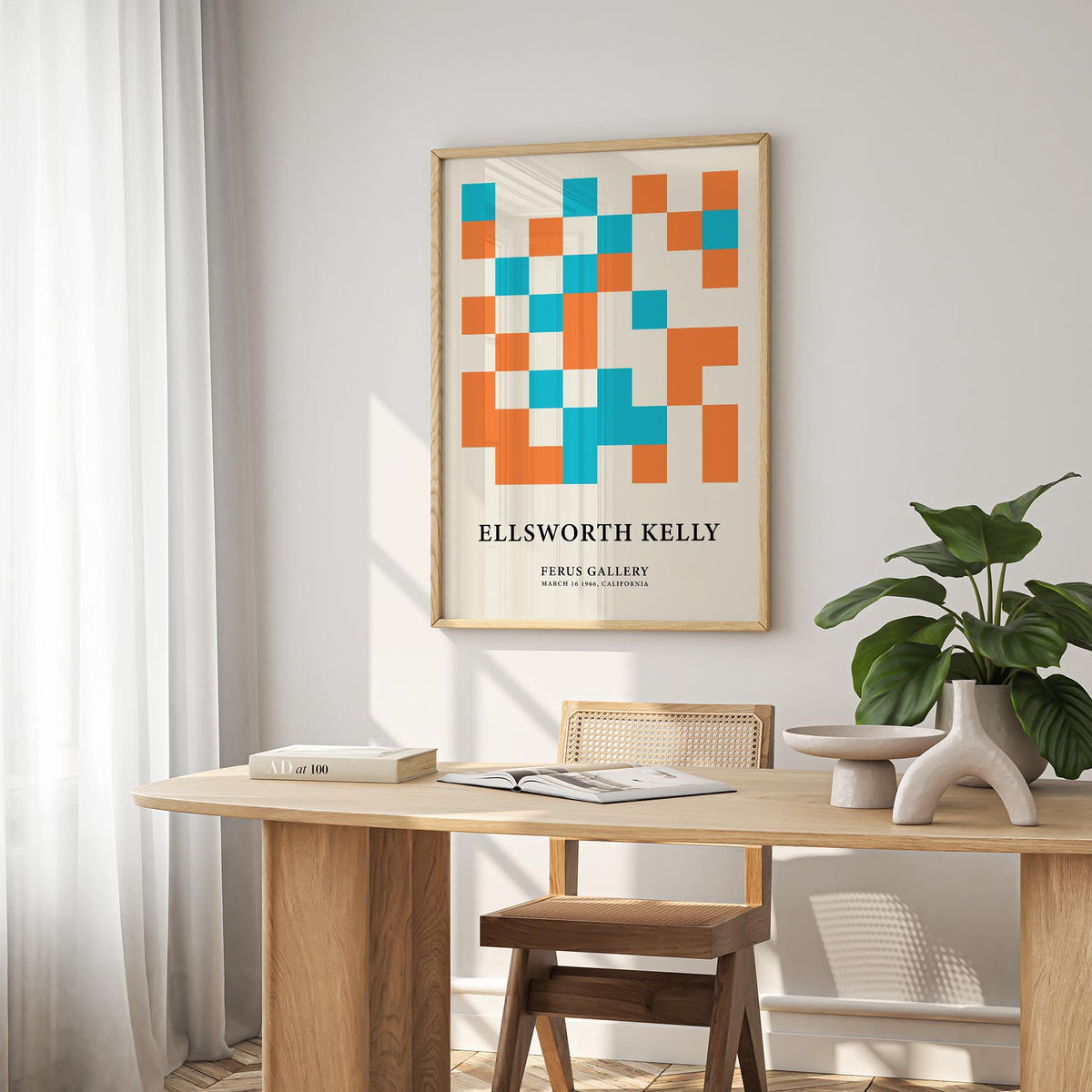 Large Geometric Wall Art with orange and blue abstract squares above a light wooden table in a dining room