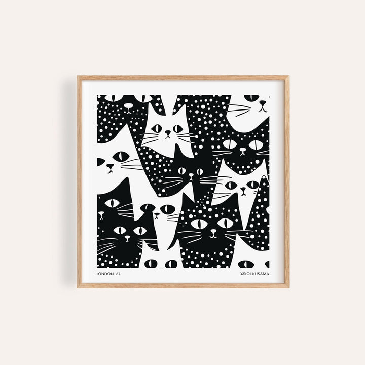Cat Art Black and White of abstract black and white cat faces with spots and stripes in a wooden frame