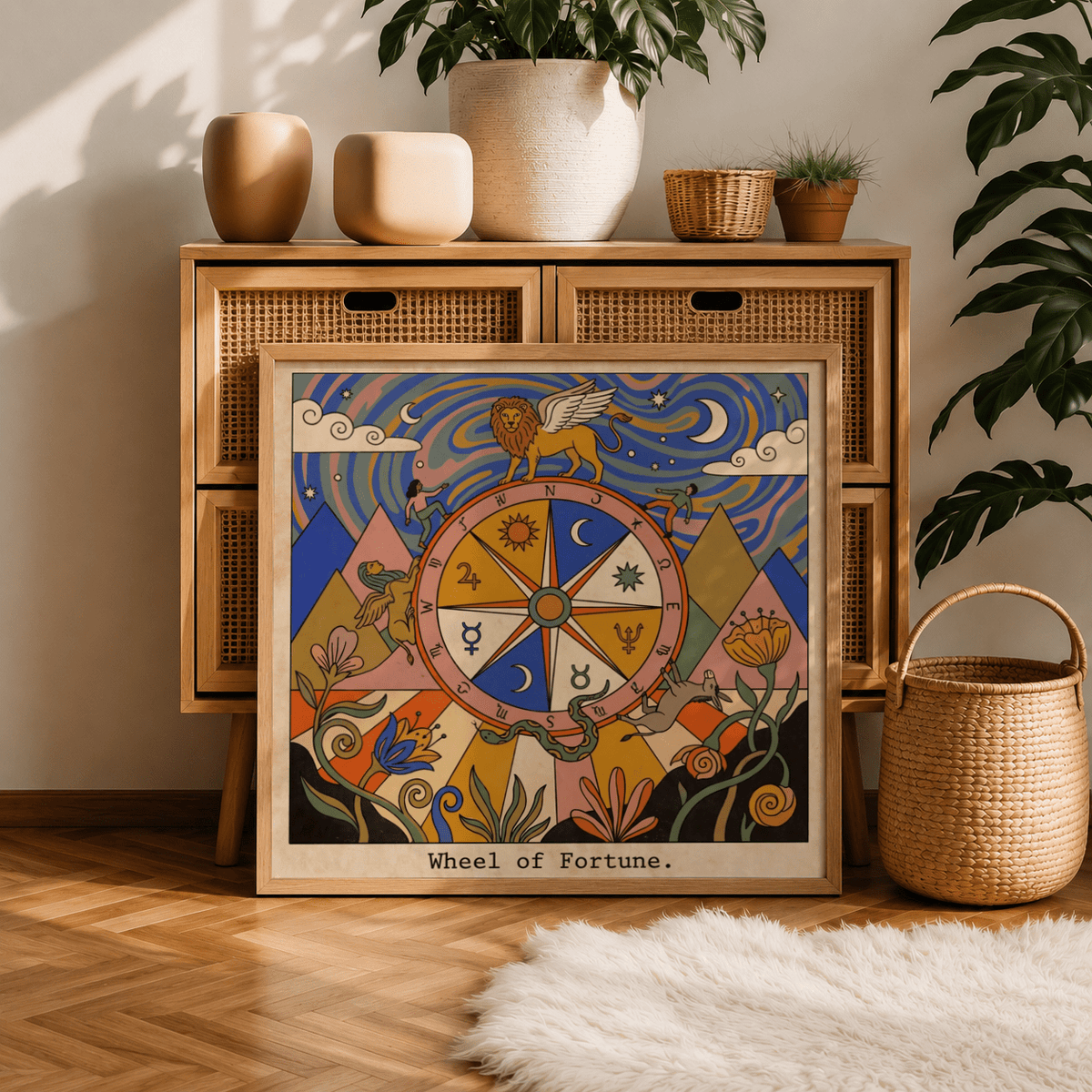 Wheel Of Fortune Tarot Card Art print leaning on a wooden cabinet with plants and baskets nearby
