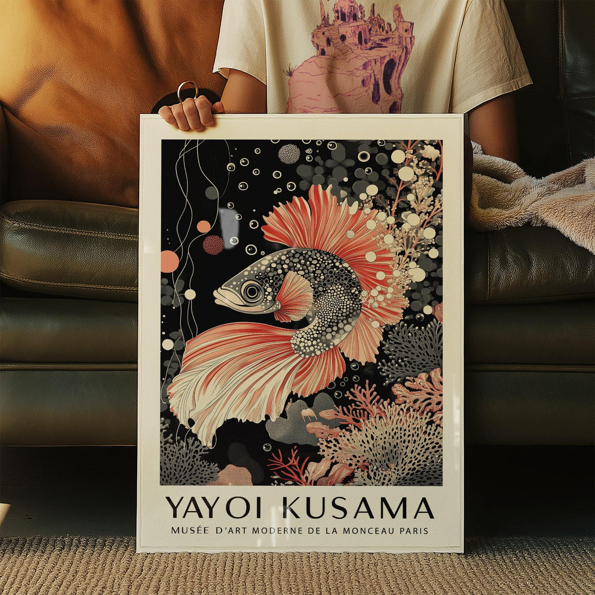 Framed Asian Wall Art of an illustrated koi fish with black and coral tones being held