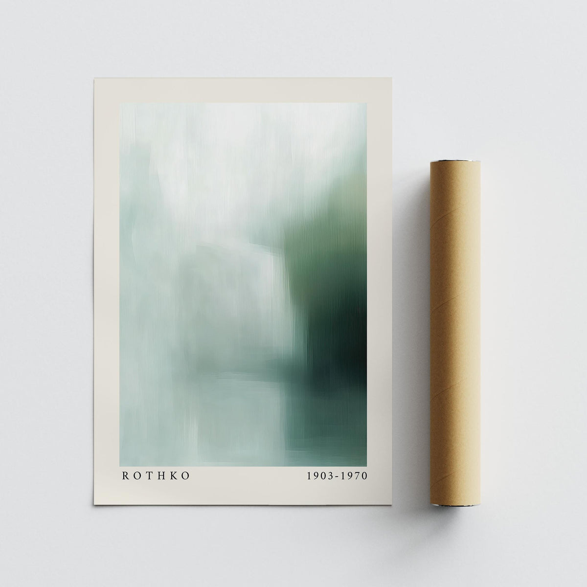 Rothko print flat on a pale surface next to a brown packaging tube with soft green and blue tones