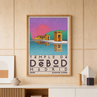 Print of Templo De Debod Art Print with yellow temple and purple sky above a white sideboard with decorative items