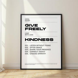 Art with Quotes black and white kindness typography print leaning on the floor beside a window