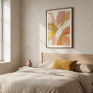 Floral Watercolor Art Print hanging above bed with beige and yellow bedding in bedroom