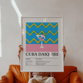 Alcohol artwork with a minimalist daiquiri glass and bold blue and yellow zigzag background held on a brown leather sofa