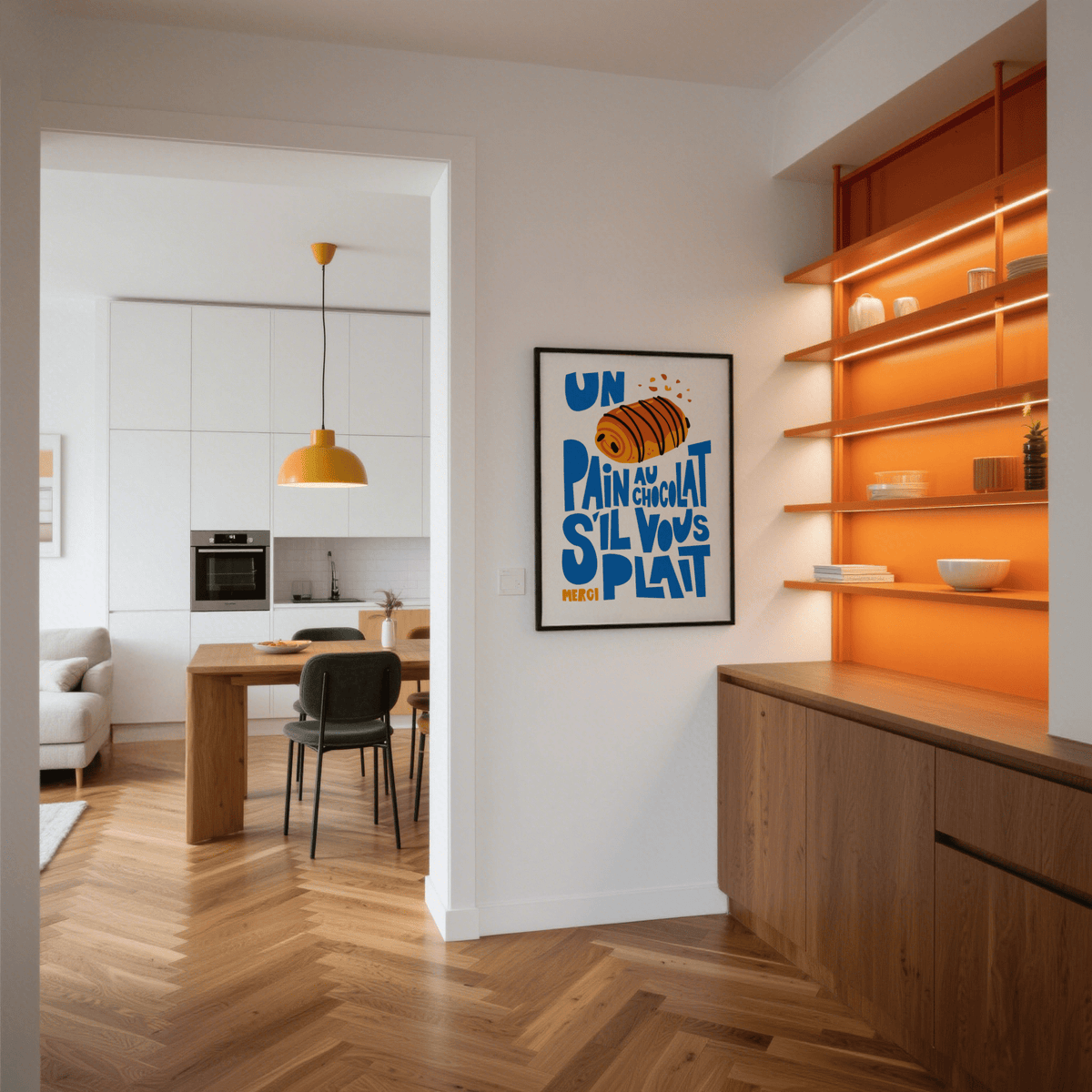 Pain Au Chocolat Print on a white wall showing an illustration and typographic design with blue and orange in a kitchen