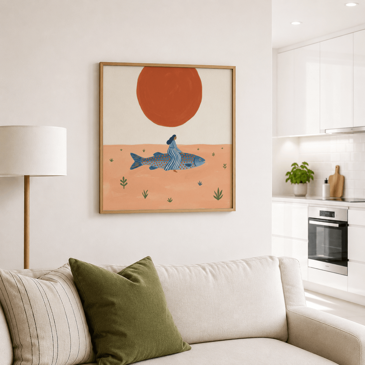 Surreal Fish Art Print hung above sofa with green and striped cushions in a bright kitchen lounge