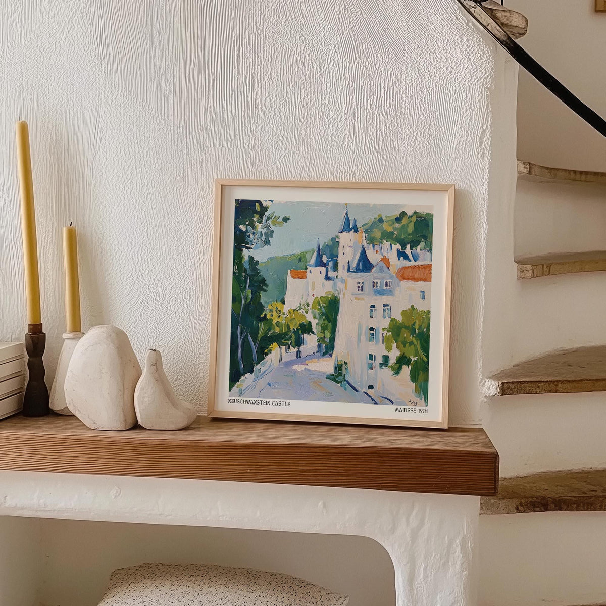 Print of Medieval Castle Art leaning on a shelf with candles and ornaments beside it