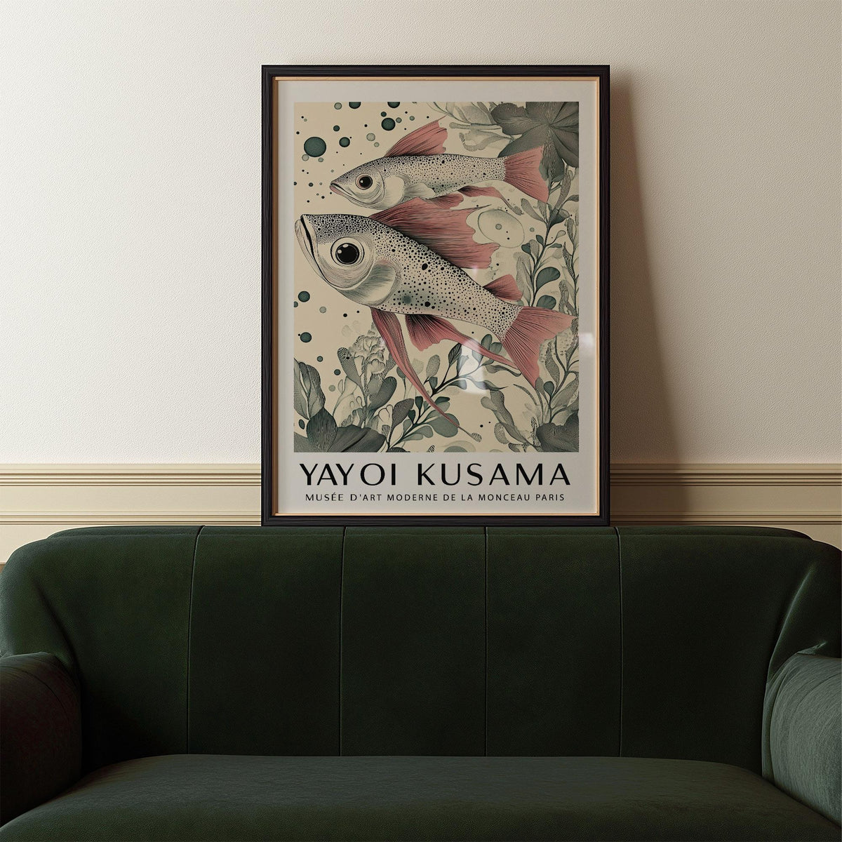 Large Fish wall art showing two pink finned fish with botanical details above a green sofa