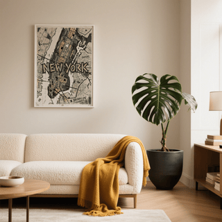New York Map Art in monochrome with yellow highlights above a white sofa with a mustard throw