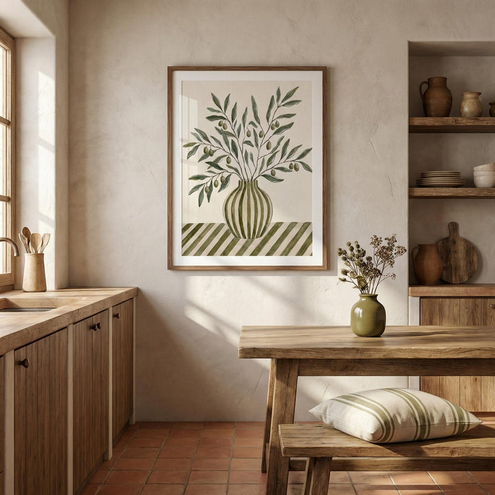 Olive Branch Art print on kitchen wall in wooden frame with dried flowers in green vase nearby